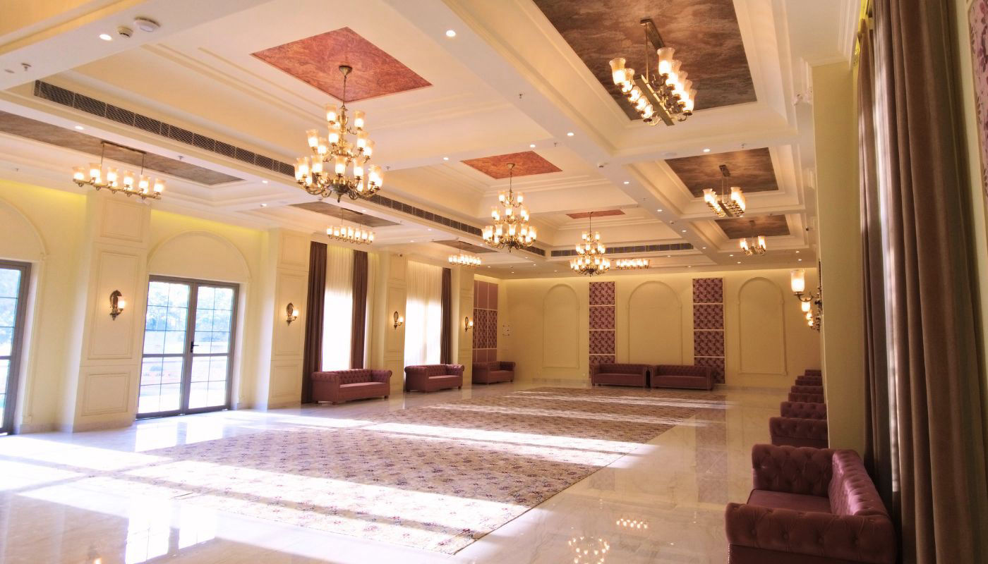 Vankamal banquet hall interior with seating and chandeliers, Jaipur