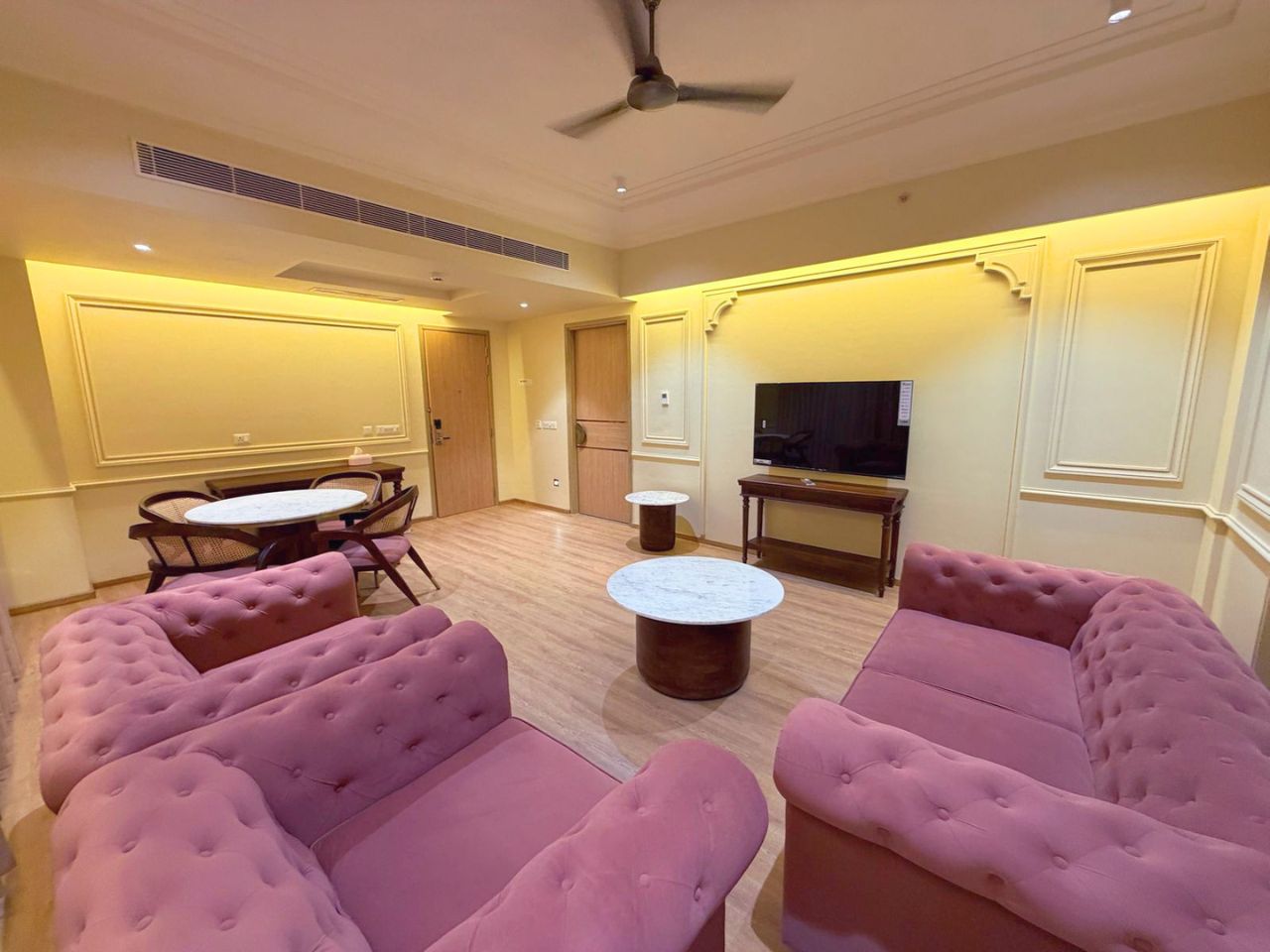 Hotel room lounge and seating area at Vankamal Resort, Jaipur